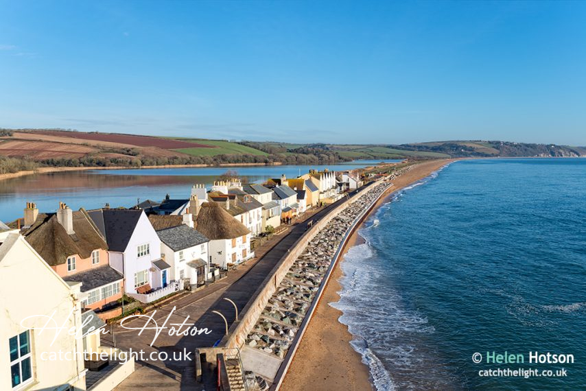 Pretty cottages at Torcross on the Devon coast, the village sits on a strip of land overlooking Slapton Sands beach with a fresh water lake behind.